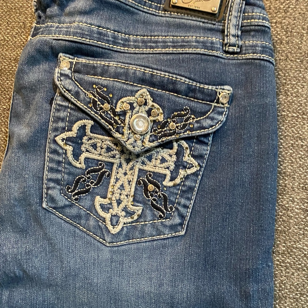 Embroidered Blue Women’s Jeans with Rhinestone Pocket Accent